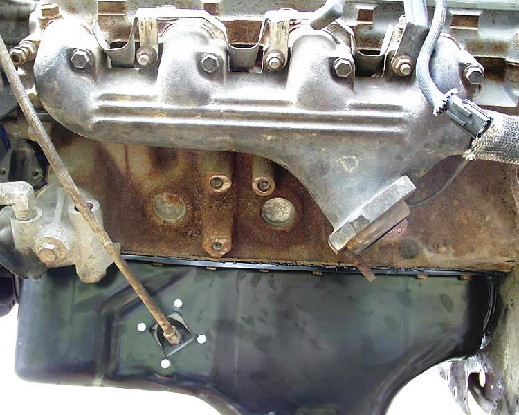 The engine mount holes on the 460 block